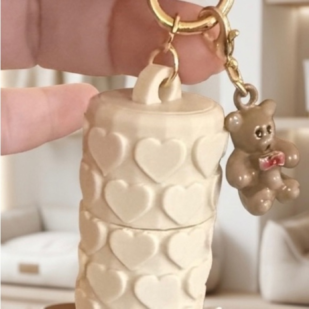 Heart-Embossed Beige Lip Balm Holder Keychain with Teddy Charm
